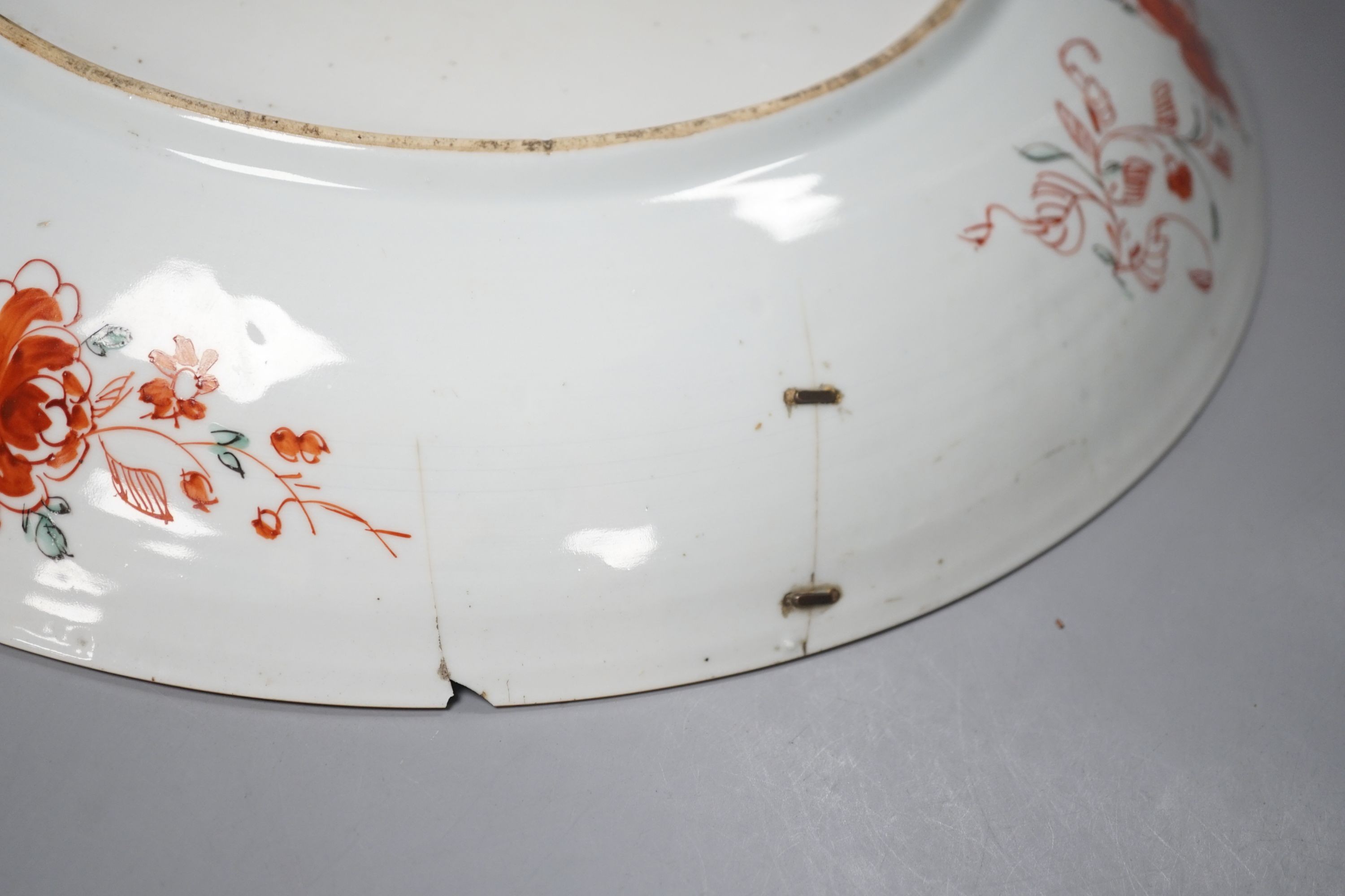 A large Chinese Kangxi dish, clobbered decoration, 37 cms diameter.